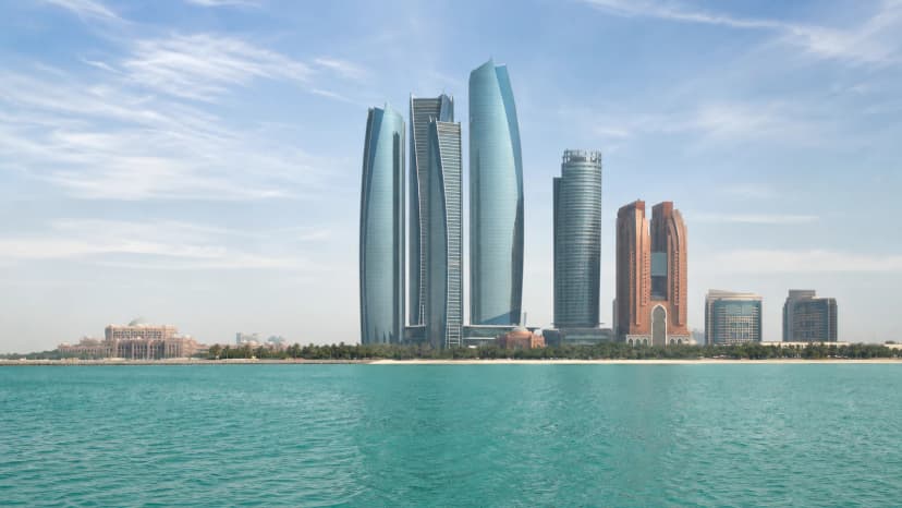 Abu Dhabi skyline and Etihad Towers beside the Corniche.