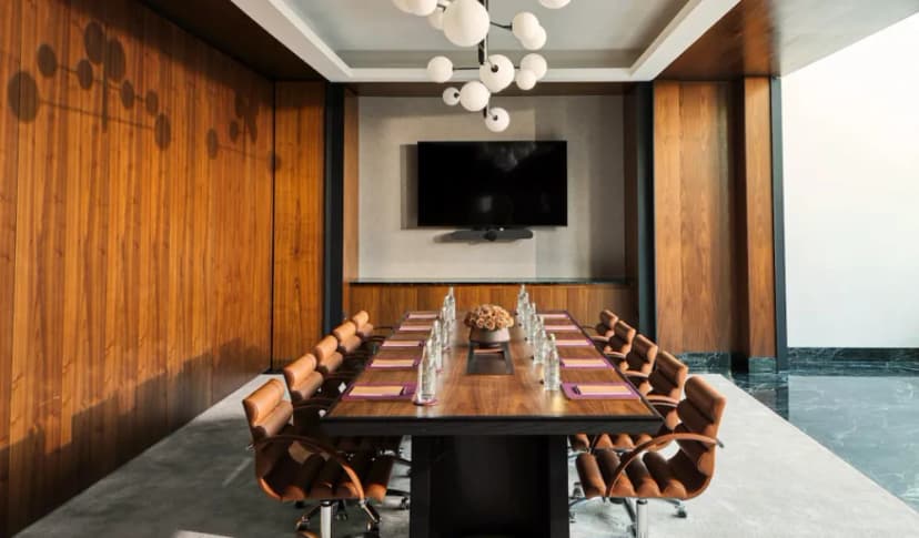 Marina boardroom at The Lana in Dubai prepared for a corporate meeting.